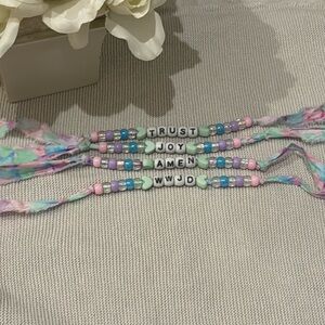 1 handmade heart ribbon bracelet with a word ( of your choice)
